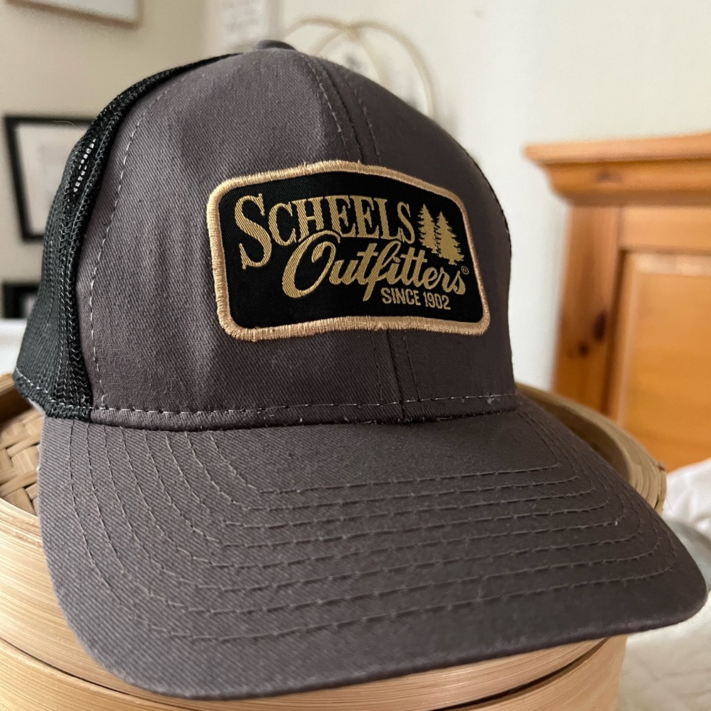Scheels brand trucker hat.